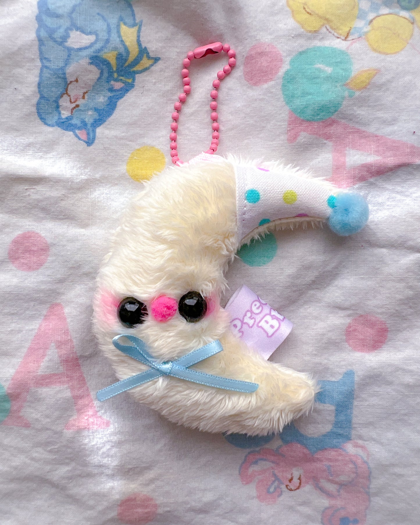 Baby Moon w/Polka Dot Hat Plush Charm