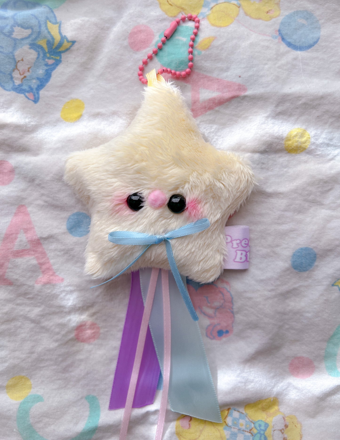 Baby Star Plush Charm w/ ribbons (black eyes and solid ribbons)