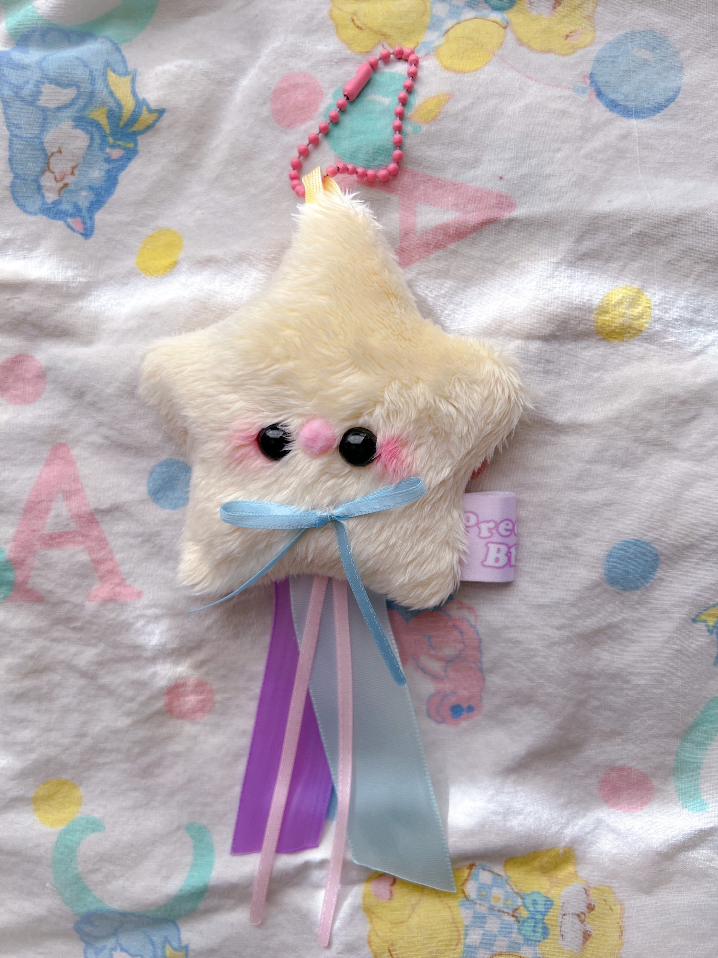 Baby Star Plush Charm w/ ribbons (black eyes and solid ribbons)