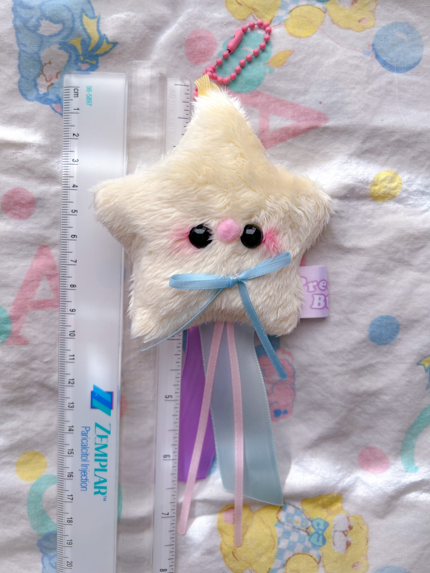 Baby Star Plush Charm w/ ribbons (black eyes and solid ribbons)